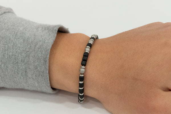 Barbieri - Bracciale in acciaio dorato con pietre nere